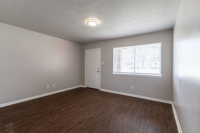 889 Lake St Unit 889A & B 890A & B, Somerville, TX 77879 - empty room with dark wood-type flooring and baseboards