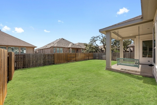 view of yard featuring a fenced backyard