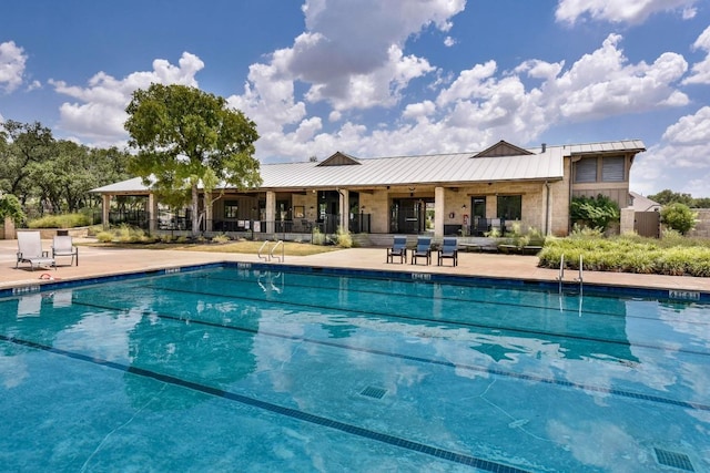 view of pool featuring a patio