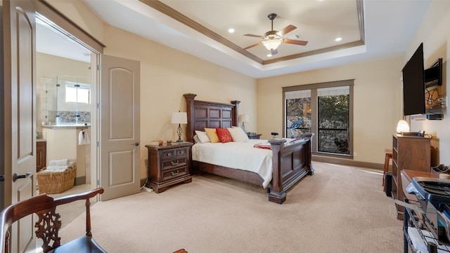 bedroom with recessed lighting, a raised ceiling, crown molding, and light colored carpet