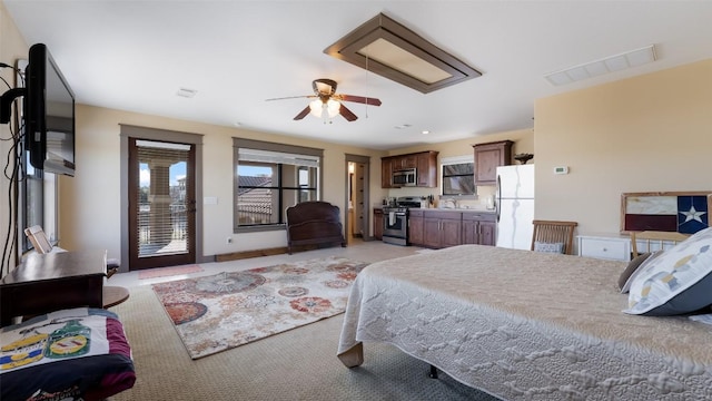 15100 Canary St, Austin, TX 78734 - bedroom with freestanding refrigerator and access to outside