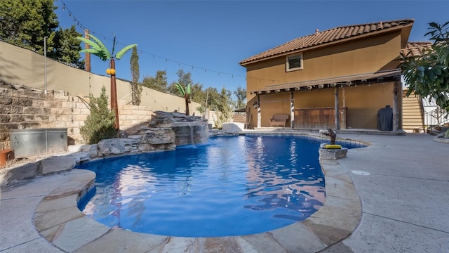 view of pool featuring a fenced in pool, a fenced backyard, and a patio