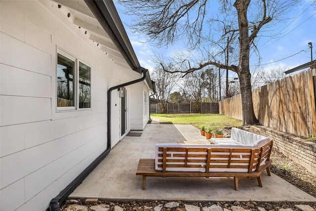 view of patio / terrace featuring a fenced backyard and an outdoor living space