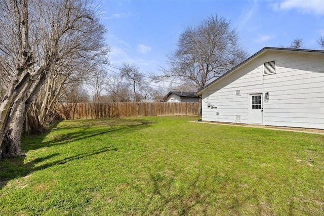 view of yard featuring fence