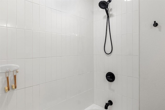 bathroom with shower / bathing tub combination