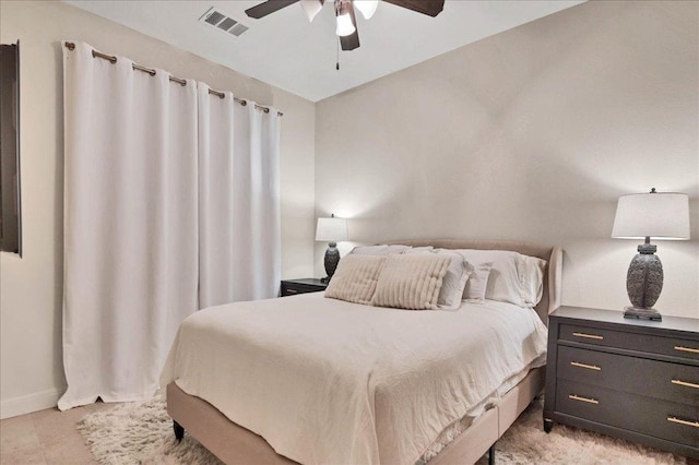 bedroom featuring visible vents, ceiling fan, and light tile patterned flooring