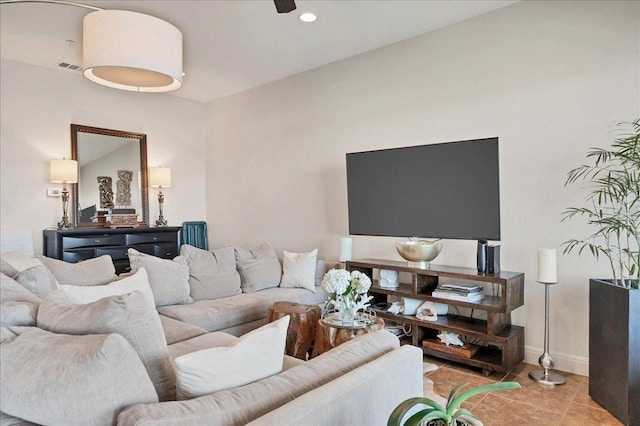 tiled living area with recessed lighting, ceiling fan, and baseboards