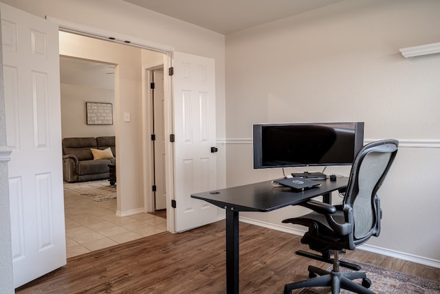 office space with wood finished floors