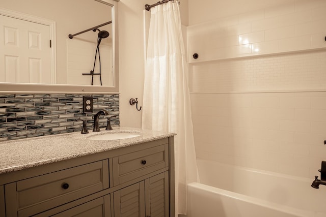 bathroom with shower / bath combination with curtain, backsplash, and vanity