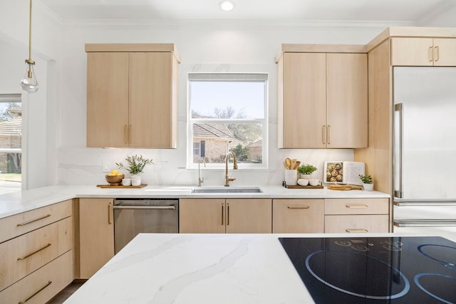 kitchen with a sink and light brown cabinets