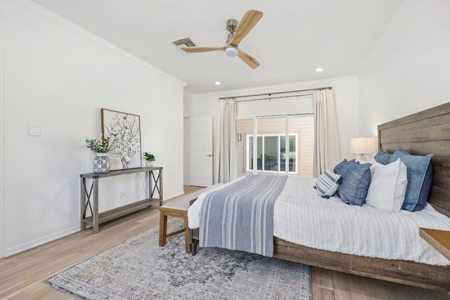 bedroom with recessed lighting, wood finished floors, visible vents, baseboards, and ornamental molding