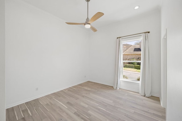 spare room with light wood-style floors, baseboards, a ceiling fan, and recessed lighting