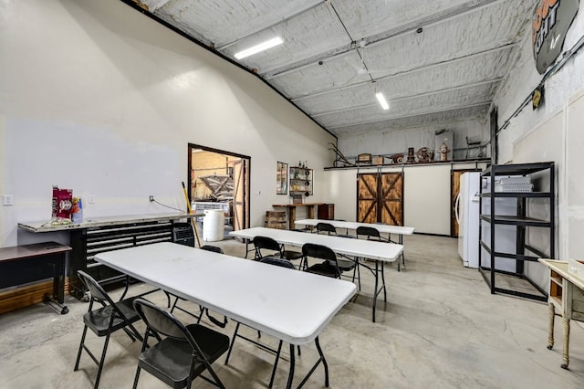 dining area with concrete floors