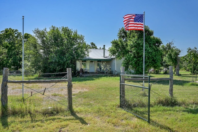 view of yard featuring a gate and fence