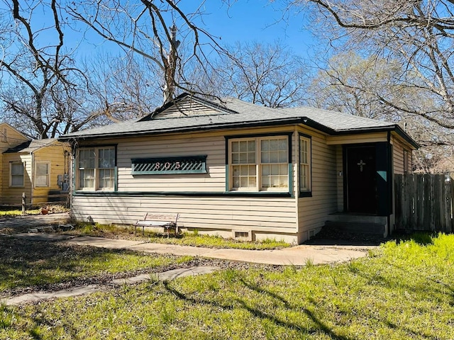 view of side of property with fence