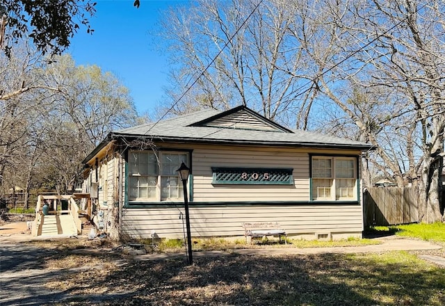 view of front of property with fence