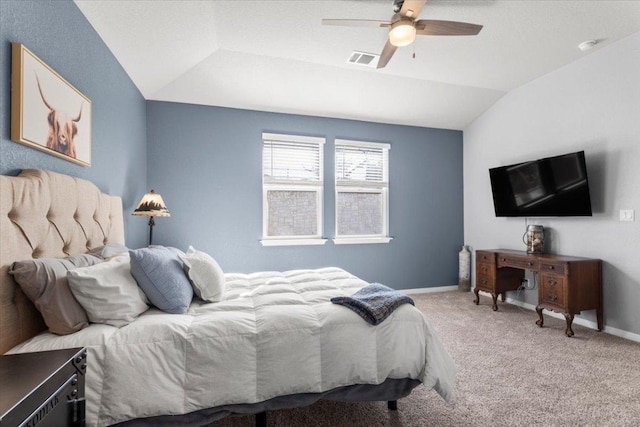 bedroom with carpet floors, visible vents, vaulted ceiling, ceiling fan, and baseboards