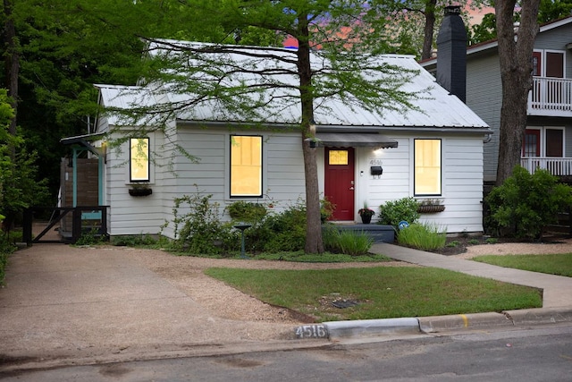 view of front of house featuring metal roof