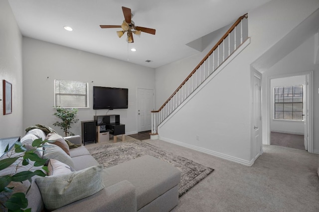 106 Park Dr, Bastrop, TX 78602 - living room featuring healthy amount of natural light, stairs, a ceiling fan, carpet floors, and recessed lighting