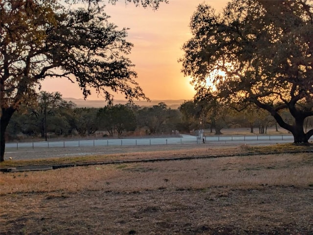 1876 Rocky Rd, Blanco, TX 78606 - view of yard at dusk