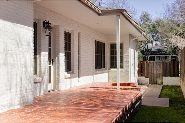 deck with a patio area and fence