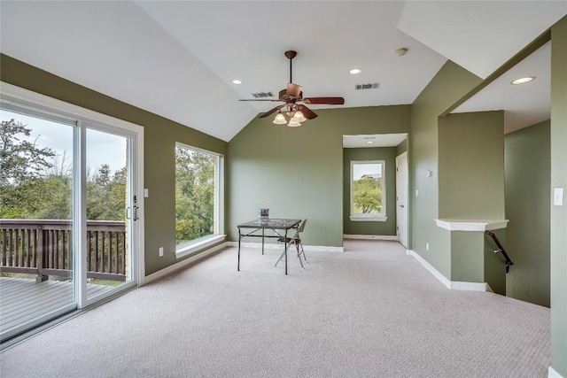 interior space with visible vents, plenty of natural light, and carpet flooring