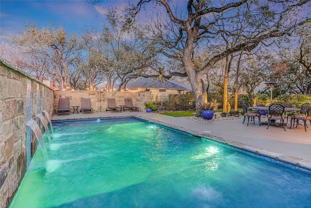 view of pool with a patio area, a fenced backyard, and a fenced in pool