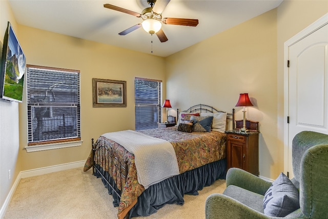 bedroom featuring carpet flooring, ceiling fan, and baseboards