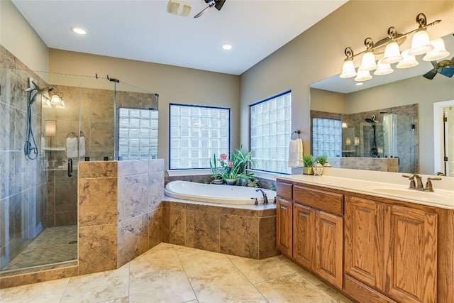 full bath with a garden tub, a shower stall, tile patterned floors, and vanity