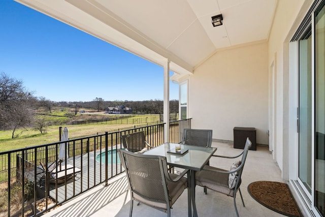 193 Raptor Beak Way, Cedar Creek, TX 78612 - balcony with view of pool and outdoor dining space