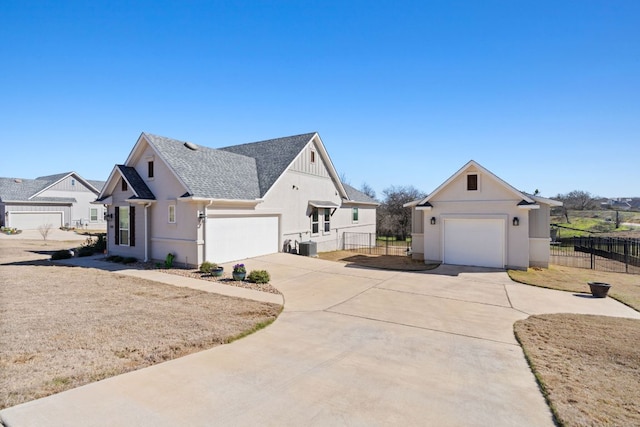 view of home's exterior featuring a shingled roof, fence, and central air condition unit