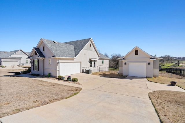 193 Raptor Beak Way, Cedar Creek, TX 78612 - view of property exterior with a garage, driveway, and stucco siding