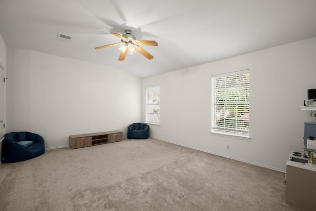 miscellaneous room with carpet, visible vents, a ceiling fan, vaulted ceiling, and baseboards