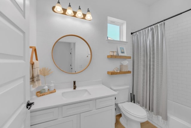 bathroom featuring vanity, toilet, and shower / bathtub combination with curtain