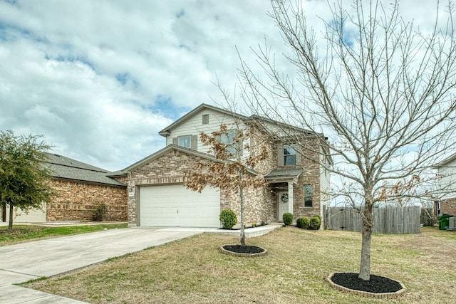 traditional-style house with driveway, a garage, fence, a front lawn, and brick siding