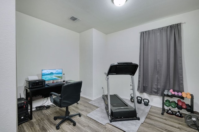 13505 Abraham Lincoln St, Manor, TX 78653 - home office with wood finished floors and baseboards