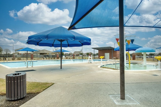13505 Abraham Lincoln St, Manor, TX 78653 - community pool featuring a patio