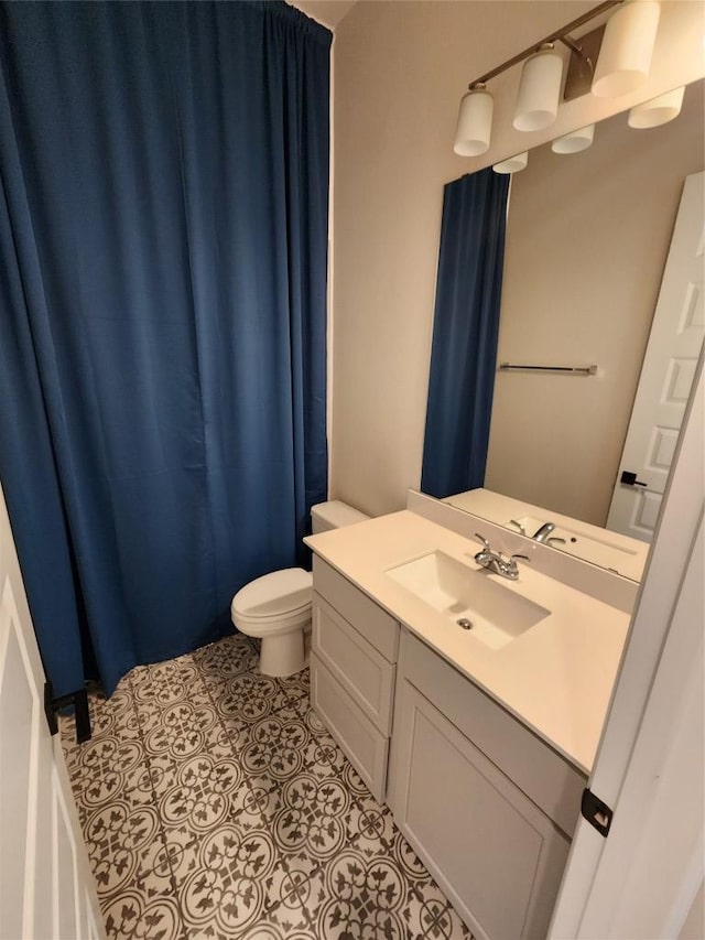 522 Jefferson Dr, Kyle, TX 78640 - bathroom featuring vanity, a shower with shower curtain, and tile patterned floors