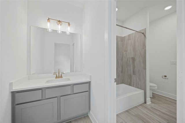 216 Echo Pass, Liberty Hill, TX 78642 - full bathroom featuring vanity, tub / shower combination, and wood finished floors