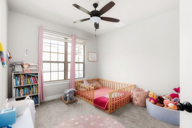 bedroom featuring carpet floors, ceiling fan, visible vents, and baseboards