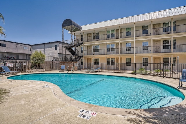 pool featuring fence