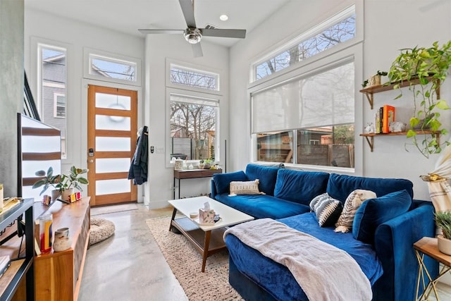 sunroom with a ceiling fan