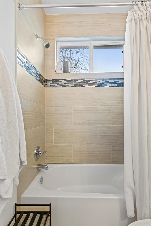 full bath featuring shower / tub combo