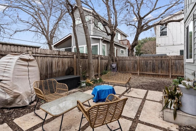 view of patio with a fenced backyard