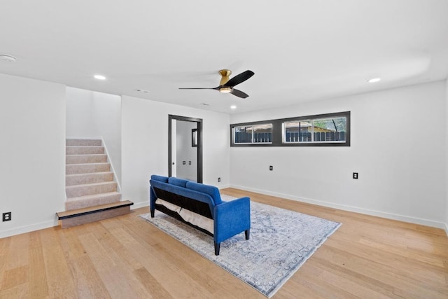 2702 S 2nd St Unit 1 & 2, Austin, TX 78704 - sitting room with light wood-type flooring, a ceiling fan, stairs, and recessed lighting