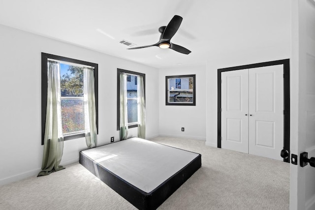 2702 S 2nd St Unit 1 & 2, Austin, TX 78704 - bedroom featuring carpet flooring, a closet, and ceiling fan