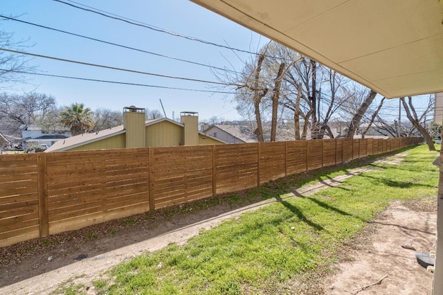 view of yard with fence