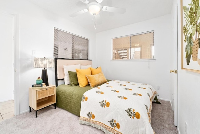 bedroom with carpet floors and a ceiling fan