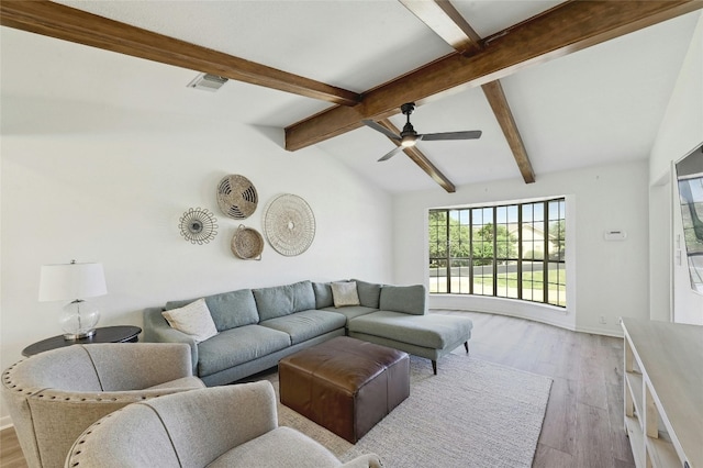 608 Sombrero Dr, Horseshoe Bay, TX 78657 - living area featuring visible vents, lofted ceiling with beams, ceiling fan, light wood-type flooring, and baseboards