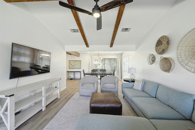 608 Sombrero Dr, Horseshoe Bay, TX 78657 - living room with ceiling fan, beamed ceiling, wood finished floors, and visible vents